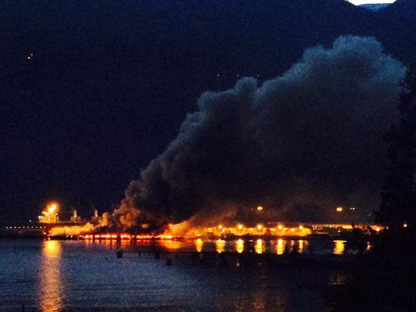 “#squamish dock fire. Photo by my husband from Chief off ramp,” tweeted one person who watched the Squamish Terminals fire as night fell.