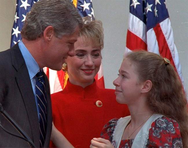Bill Clinton is joined by wife, Hillary, and daughter Chelsea, right, in Little Rock, Ark. on the day he announced his bid for the presidency in this Nov. 3, 1991 file photo. 