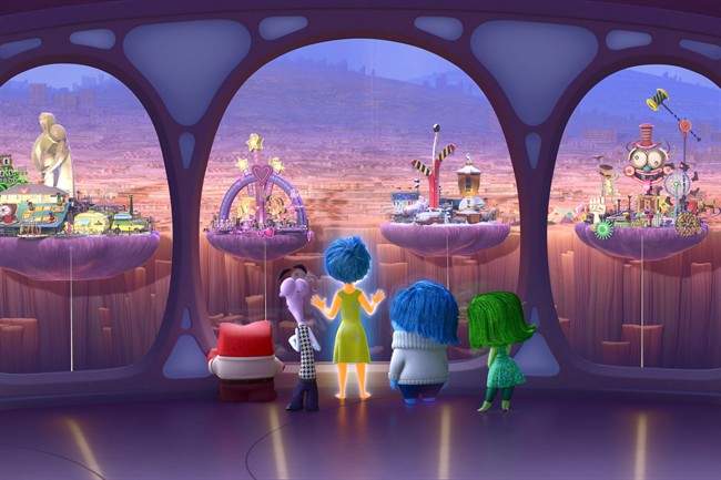 This photo provided by Disney-Pixar shows , Anger, Fear, Joy, Sadness and Disgust look out upon Riley’s Islands of Personality, in a scene from the new animated film, “Inside Out.”