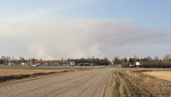 Six fire departments battle through the night to bring a grass fire near Borden, Sask. under control.