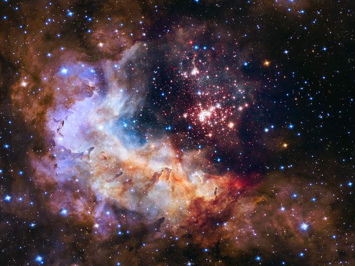 This stunning image released on April 23, 2015, reveals a cluster of stars along with a stellar nursery located in the southern constellation Carina.