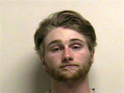This undated booking photo provided by the Utah County Jail shows Jordan Lindquist, 19, of Saratoga Springs, Utah. Lindquist was taken into custody on Friday, April 17, 2015 on a felony animal cruelty charge. Lindquist was arrested after video footage showed him violently beating a house cat. The cat was seen being shaken, grabbed by the tail, punched in the head and slammed to the ground.