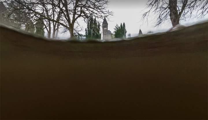 This photo, titled 'From Nessie's perspective' was taken as the camera breached the water of Loch Ness from below.