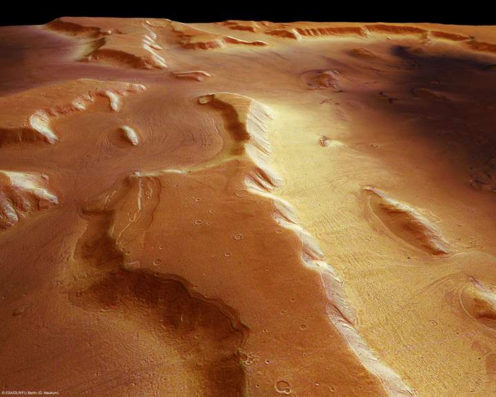 The image from the High Resolution Stereo Camera shows that a thick layer of dust covers the glaciers, so they appear as the surface of the ground, but radar measurements show that there are glaciers composed of frozen water underneath the dust.