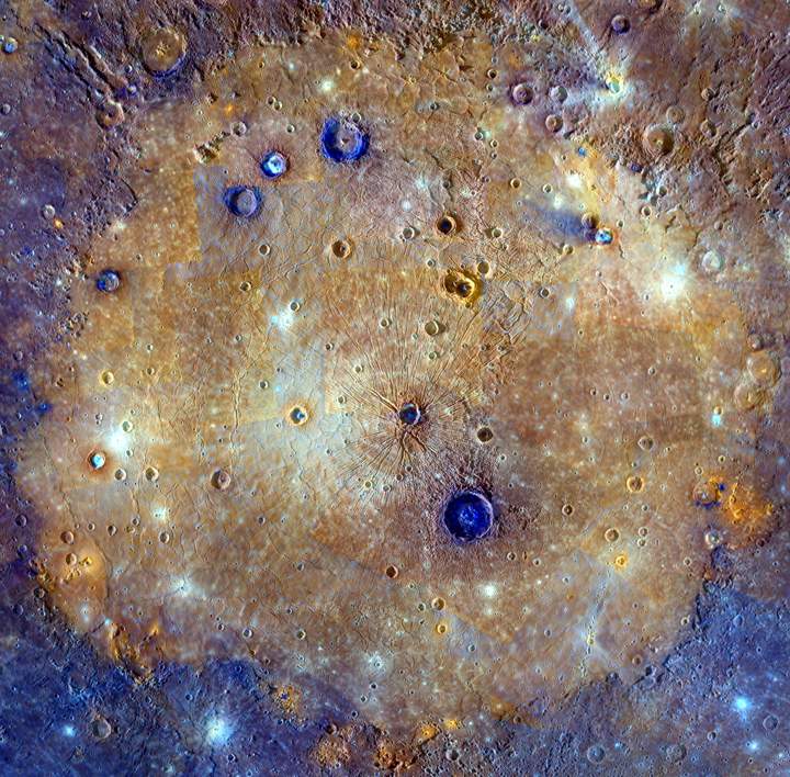 The enhanced-colour mosaic is made up of images taken when both the spacecraft and the Sun were overhead, conditions best for discerning variations in albedo, or brightness.