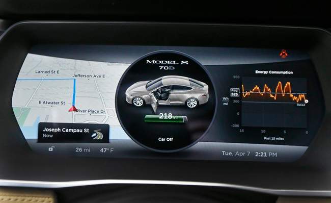 Tesla boosts range power and price of low-end Model S