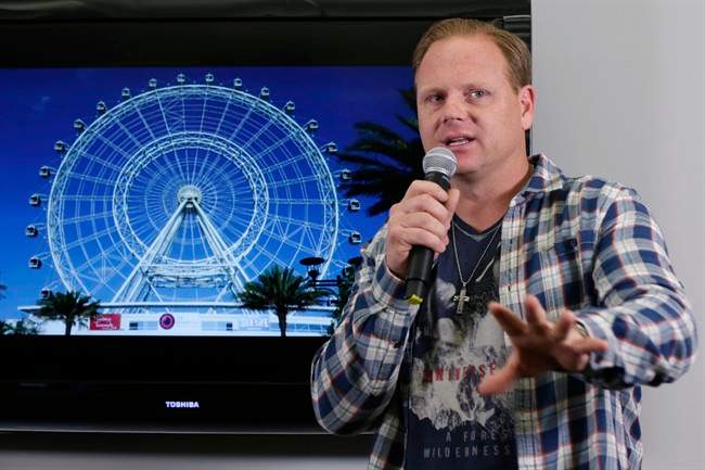 High-wire performer Nik Wallenda announces his latest stunt at the 400-foot Orlando Eye, during a news conference, in New York, Monday, April 13, 2015. 