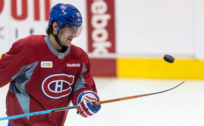 Montreal Canadiens' Max Pacioretty juggles a puck with his stick.