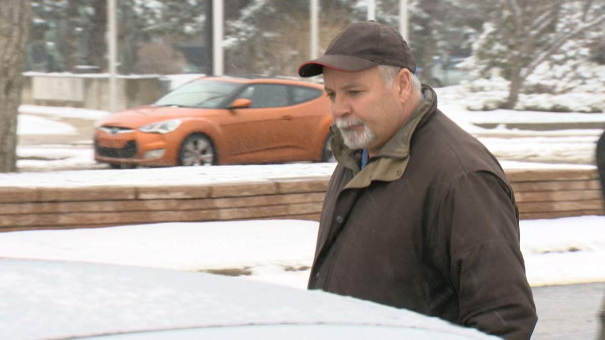 Lee Bonneau’s father, David Bonneau, leaves a Regina courthouse following testimony Tuesday.