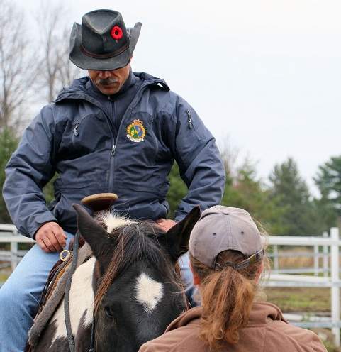 Roger Boudreau riding Dakota for the first time at the War Horse Project.