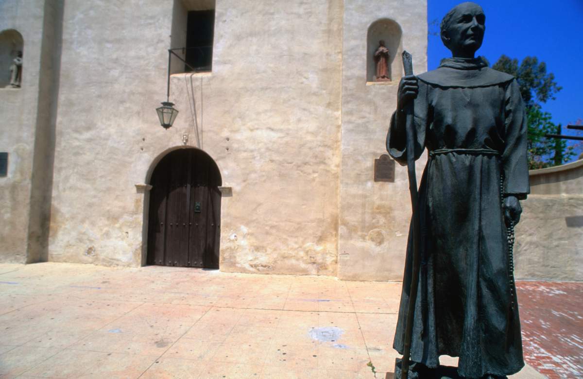 Statue of Father Junipero Serra (1713-1784) in the grounds of Mission San Gabriel in California.