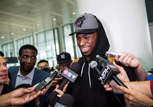 Toronto born NBA rookie of the year Andrew Wiggins is seen at a media event at Toronto Pearson International Airport as he returns to Toronto after his season with the Minnesota Timberwolves on Saturday, May 2, 2015. 