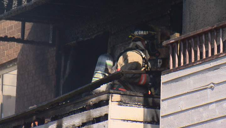 Propane tank explodes as Saskatoon firefighters fight blaze at an apartment building.