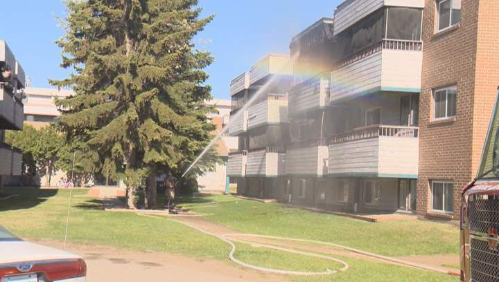 Propane tank explodes as Saskatoon firefighters fight blaze at an apartment building.