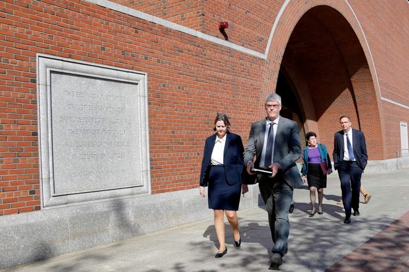 Members of the defense team for convicted Boston Marathon bomber Dzhokhar Tsarnaev, from left, Judy Clarke, Timothy Watkins, Miriam Conrad and William Fick leave federal court in Boston, Thursday, May 14, 2015.