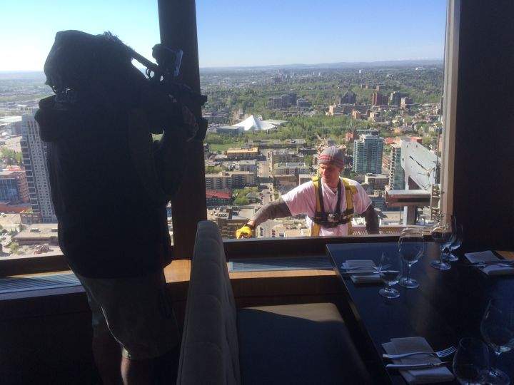 ‘A little scary at times,’ says painter touching up the Calgary Tower - image
