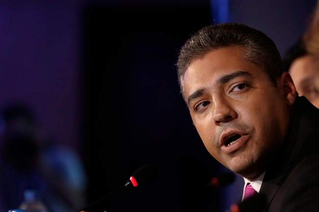 Al-Jazeera English's former acting bureau chief, Canadian-Egyptian journalist Mohammed Fahmy, speaks during a press conference in Cairo, Egypt, Monday, May 11, 2015.