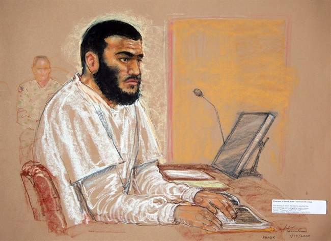Canadian defendant Omar Khadr sits during a hearing at the U.S. Military Commissions court for war crimes, at the U.S. Naval Base, in Guantanamo Bay, Cuba, Jan. 19, 2009.  THE CANADIAN PRESS/AP, Janet Hamlin, Pool.