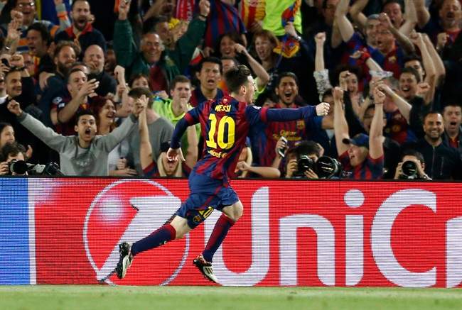 Barcelona's Lionel Messi celebrates after scoring the opening goal during the Champions League semifinal first leg soccer match between Barcelona and Bayern Munich at the Camp Nou stadium in Barcelona, Spain, Wednesday, May 6, 2015.