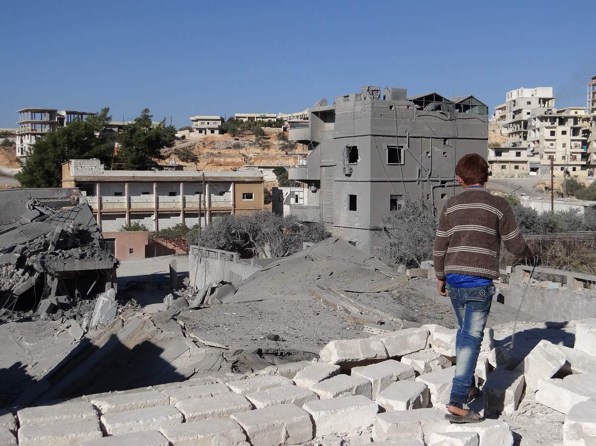 Debris is seen following a US-led coalition airstrike hits Headquarters of al Nusra Front in Aleppo, Syria on November 06, 2014. 