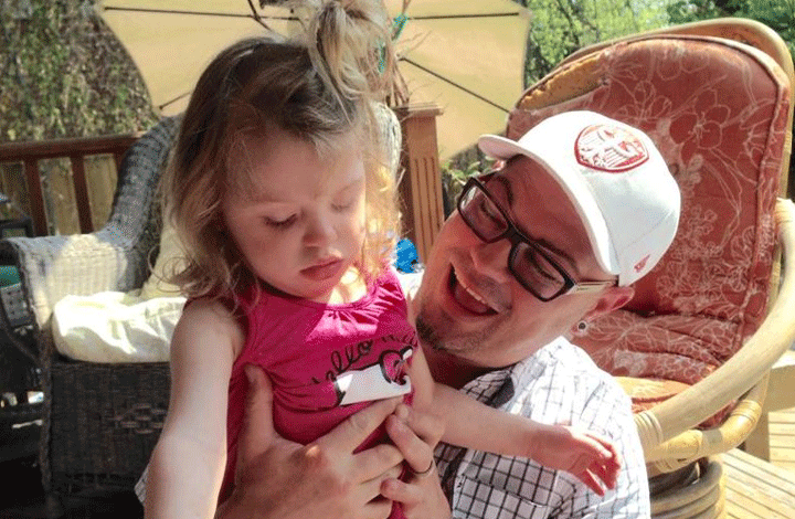 Gwenevere Leia Repetski and her father Alex are shown in this photo provided by the family.