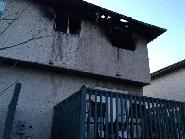 Fire broke out in the bedroom of a townhouse located at 15128 - 22 St. in northeast Edmonton early Thursday morning. May 14, 2015.