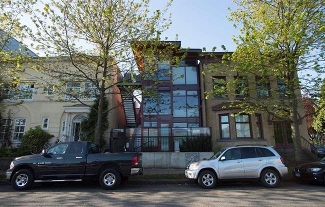 A container home is pictured in downtown Vancouver, B.C. Monday, April 20, 2015. They were once rusting hulks relegated to junkyards.Now shipping containers are being repurposed into stylish homes that developers plan to roll out in housing-crunched communities across Canada. 