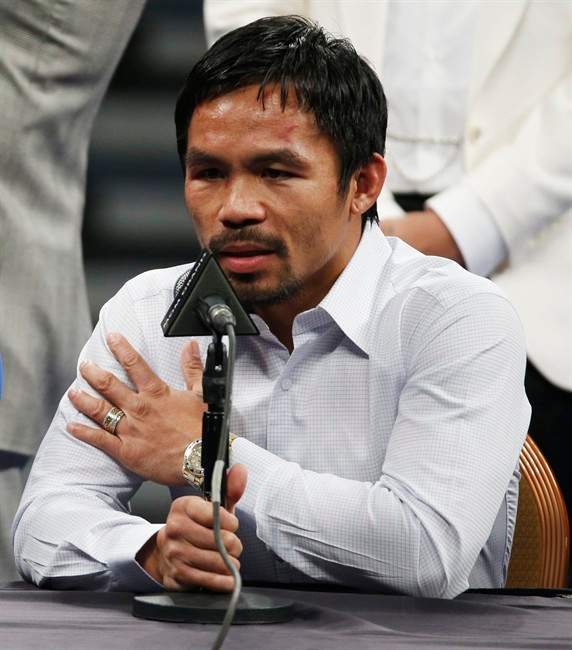 FILE - In this May 2, 2015 photo, Manny Pacquiao answers questions during a press conference following his welterweight title fight against Floyd Mayweather Jr. in Las Vegas.