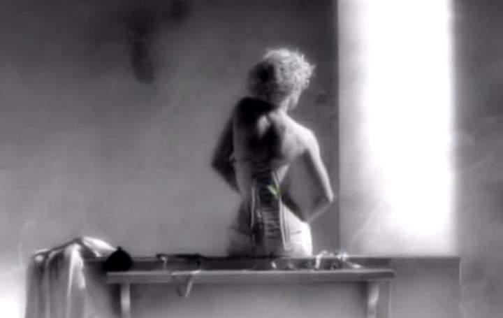 A still from Madonna’s “Vogue” video, inspired by Horst’s Mainbocher Corset.