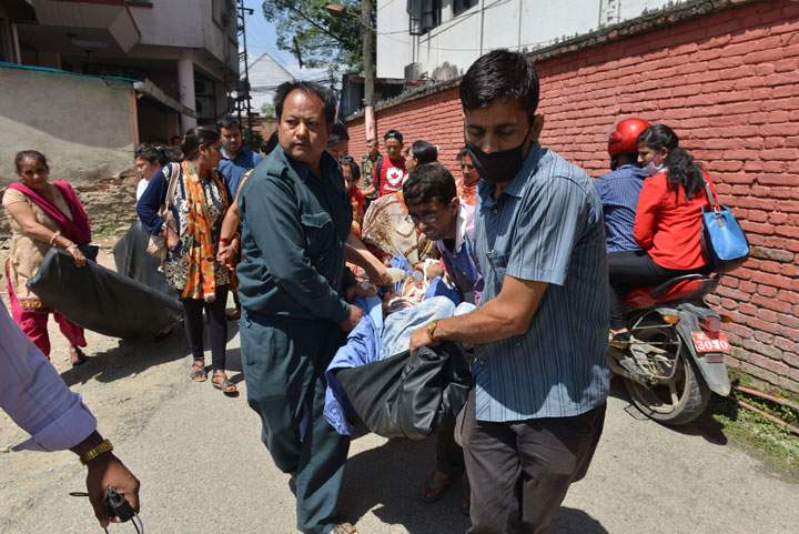 A 7.3-magnitude earthquake hit devastated Nepal, sending terrified residents running into the streets in the capital Kathmandu on May 12, 2015.