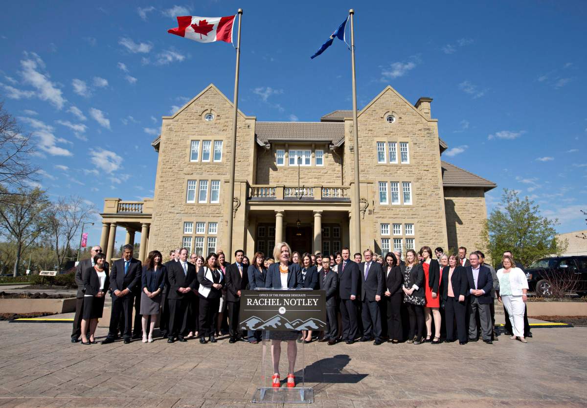 Alberta Premier-designate Rachel Notley addresses the media in front of her caucus at Government House in Edmonton, Alta., on Saturday, May 9, 2015.