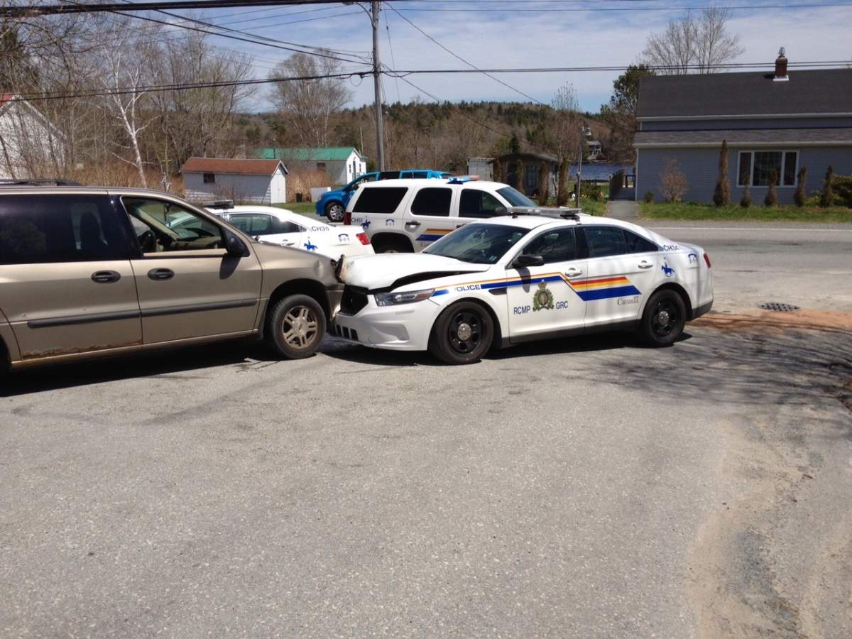 Three people have been charged after a van being pursued by police spun out of control and collided with two cruisers in Lake Echo on Thursday.