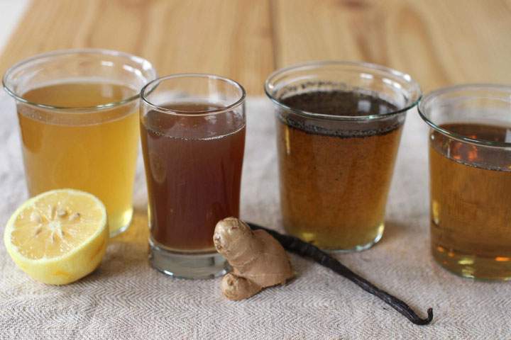 This April 20, 2015 photo shows, from left, lemon, ginger, vanilla and plain simple summer syrups in Concord, N.H.