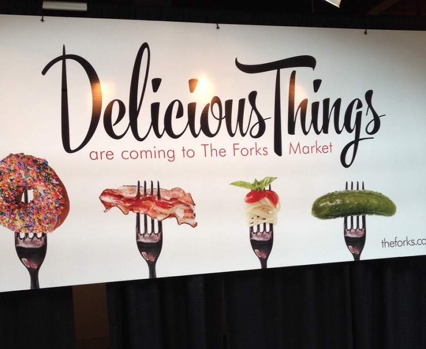 A sign hints at Tuesday’s big announcement at The Forks regarding changes on the way to The Forks Market.
