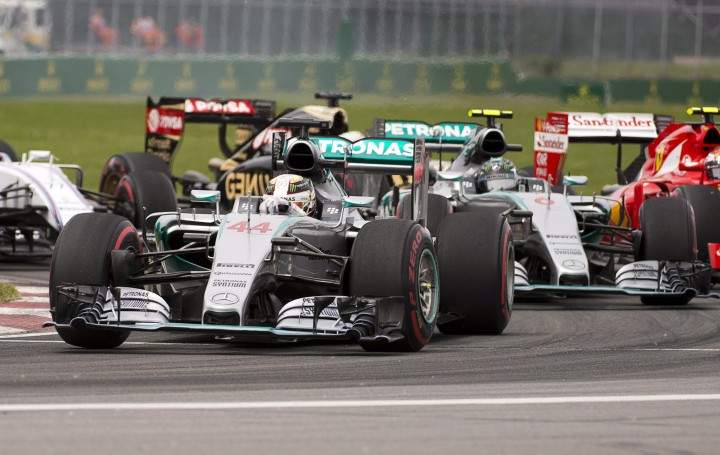 Mercedes driver Lewis Hamilton of Great Britain (44) leads teammate Nico Rosberg of Germany (6) through the Senna corner at the Canadian Grand Prix in Montreal on Sunday, June 7, 2015.
