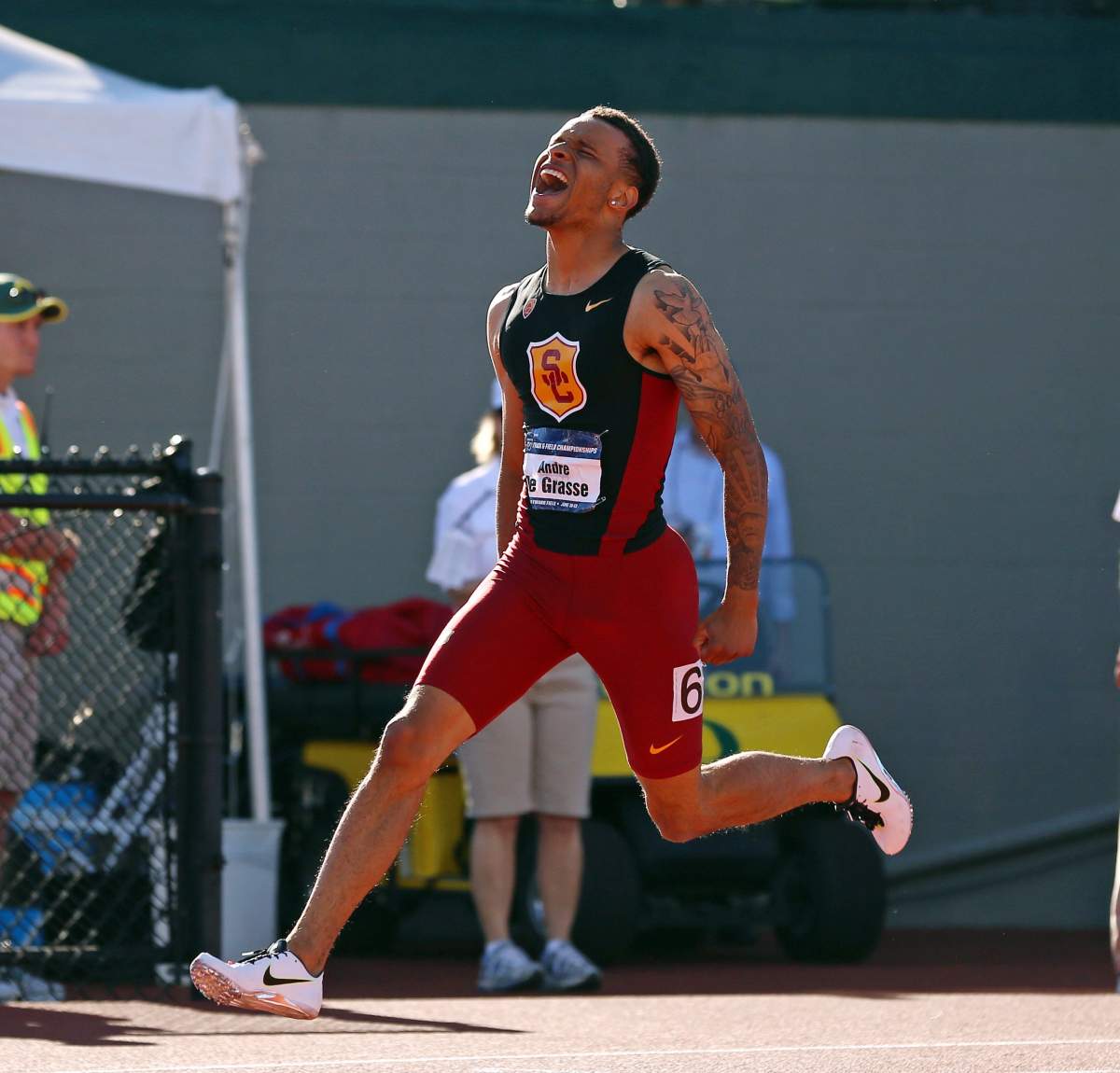 Canadian sprinter Andre De Grasse reacts after winning the 200-meter race during the NCAA track and field championships in Eugene, Ore., Friday, June 12, 2015.