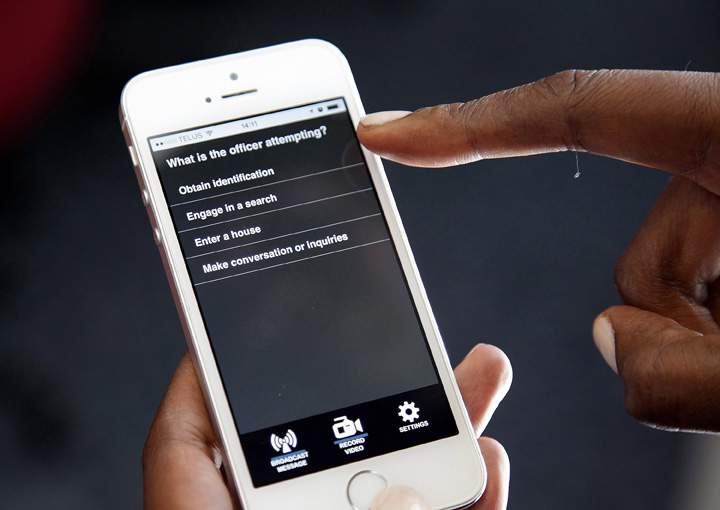A new smartphone app that aims to offer quick legal advice to people stopped at random by police is seen in Toronto on Monday, June 29, 2015. The free app has been developed by a law-school grad and also offers a video-recording and emergency email feature. 