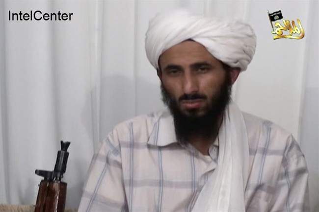 FILE - This image from video released Jan. 23, 2009, by al-Malahim Media Foundation and provided by IntelCenter on Dec. 30, 2009, shows the leader of Al-Qaida in the Arabian Peninsula, identified by the IntelCenter as Nasir al-Wahishi, in Yemen. Al-Qaida on Tuesday, June 16, 2015 confirmed that al-Wahishi, its No. 2 figure and leader of its powerful Yemeni affiliate, was killed in a U.S. strike, making it the harshest blow to the global militant network since the killing of Osama bin Laden.