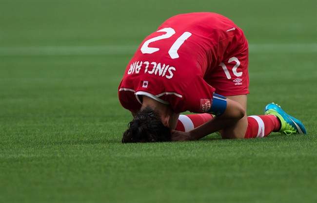 Canada's Christine Sinclair reacts after losing 2-1 to England during a FIFA Women's World Cup quarter-final soccer game in Vancouver on June 27, 2015.