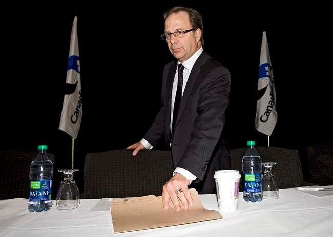 Steve Laut, president of Canadian Natural Resources Ltd., prepares to address the company's annual meeting in Calgary, Thursday, May 3, 2012. 