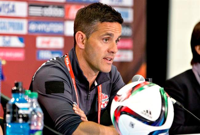 Canadian women's soccer team coach John Herdman speaks to media before practice session in Edmonton, Alta., on Friday June 5, 2015.