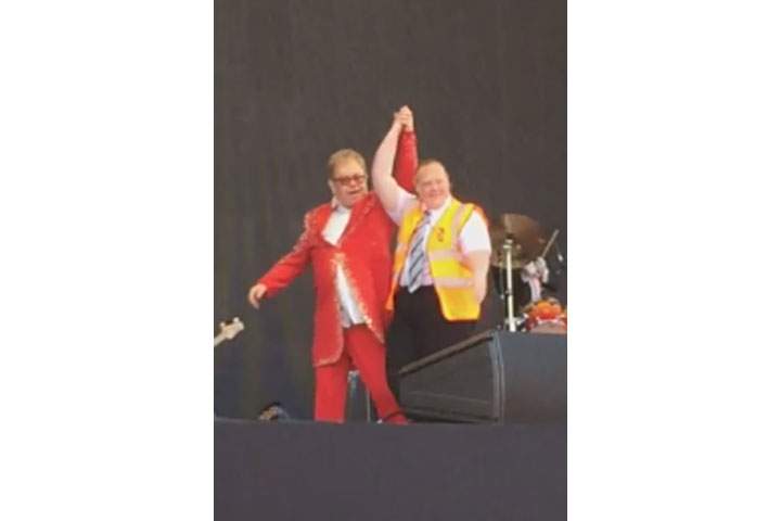 Elton John apologized to the usher on stage.