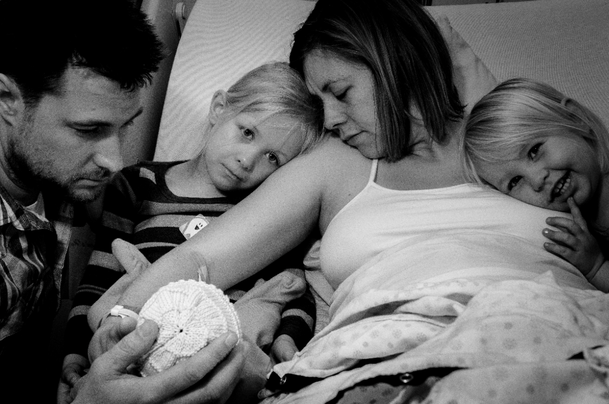 Caitie Grange and her family with baby Elizabeth.