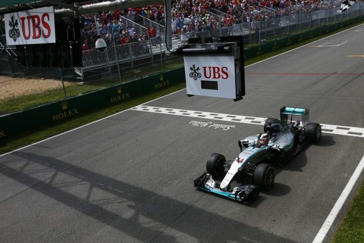 Lewis Hamilton, Mercedes F1 W06 Hybrid crosses the line to win the race. Canadian Formula One 1 Grand Prix, Circuit Gilles Villeneuve, Montreal, Canada - 07 Jun 2015.