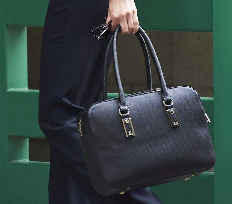 Your bag might be causing you back problems.