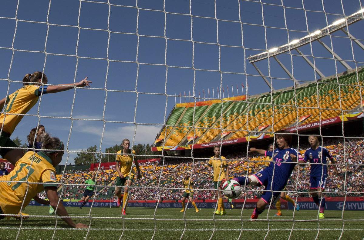 Japan’s Mana Iwabuchi (16) scores a goal on Australia’s during second half FIFA Women’s World Cup quarter-final action in Edmonton, Alta., on Saturday June 27, 2015.