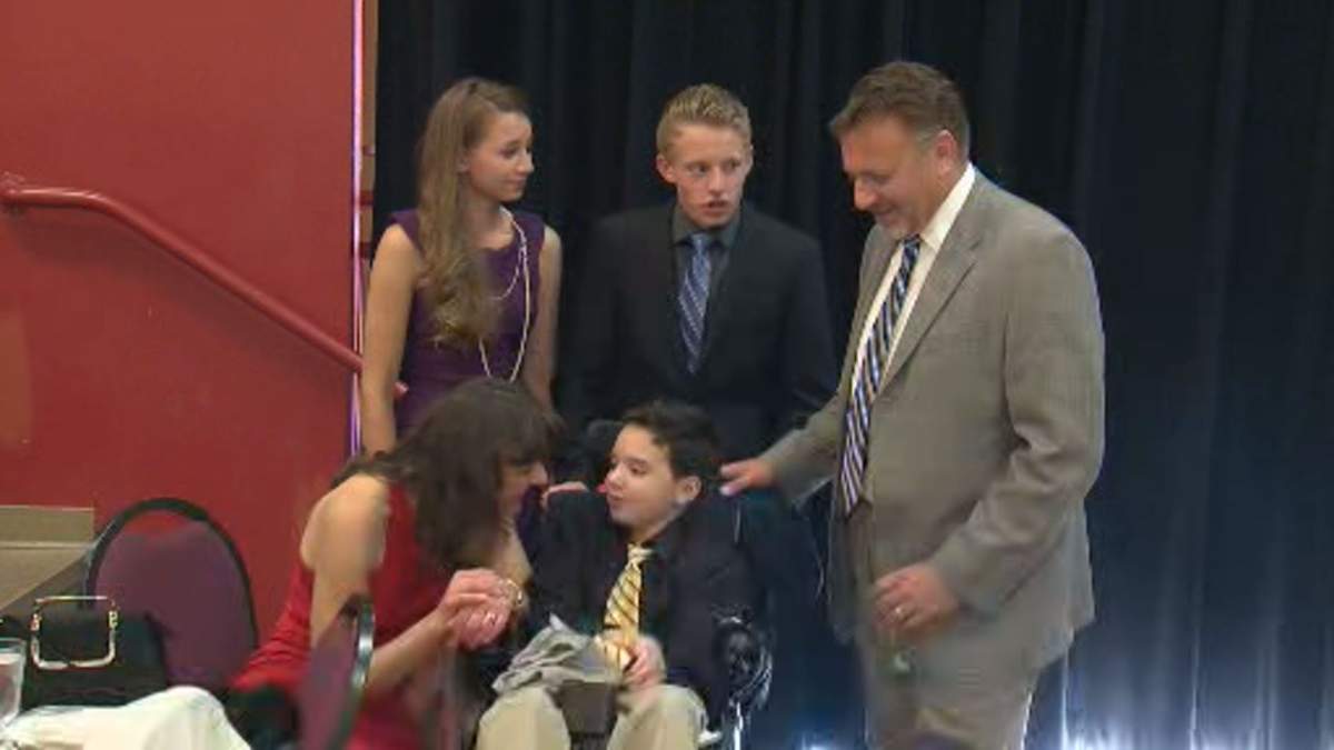 The Kitzul family at the Bearspaw Lions Club Sunday for a fundraiser helping their son.