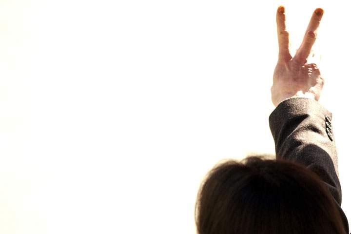Michael Jackson gives the peace sign in March 2005.