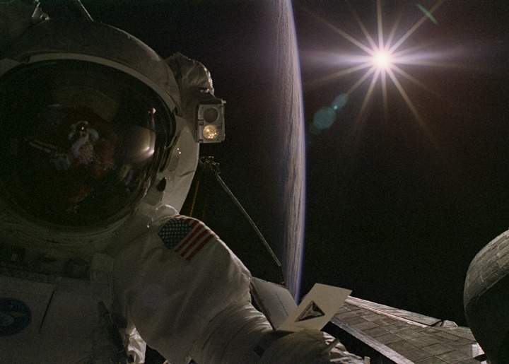 Gregory Harbaugh photographed fellow astronaut Joseph Tanner during their second spacewalk to service the Hubble Space Telescope in February 1997.