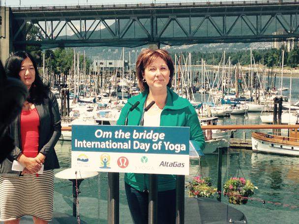 Christy Clark making the announcement about Om the Bridge.